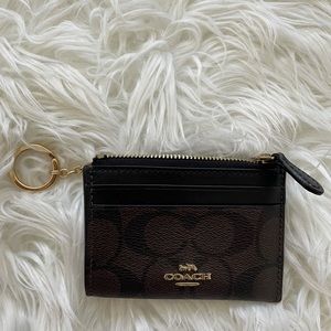 Coach small coin purse with keychain.